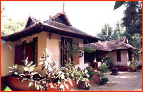 A  Holiday in a heritage 'Tharavadu' - ancestral home of Kerala. Furnished in all traditional charm with antique furniture and artifacts, this farmhouse is surrounded by a thick canopy of tall trees and set amidst the scenic Royal Village with easy access to Cochin city by road and Backwaters. 